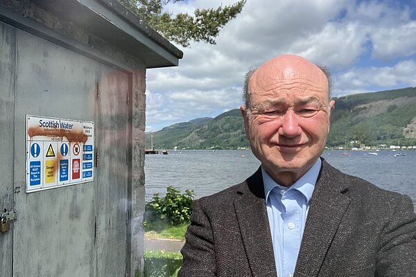 Alan at Ardnadam sewage works with the Holy Loch in the background